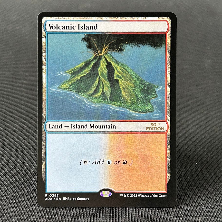 Volcanic Island 30th holo Volcanic Island 30th holo - Image 1