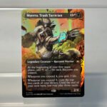 Muerra, Trash Tactician #352 (raised golden foil)EN